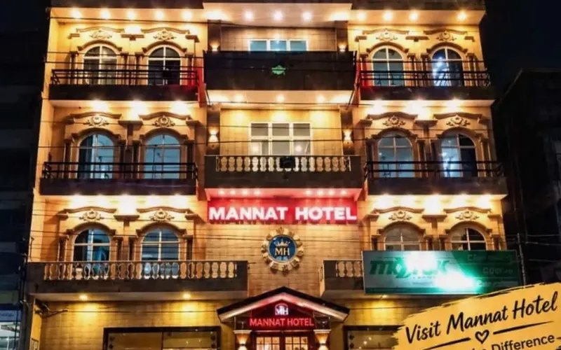 Mannat Hotel Islamabad exterior at night