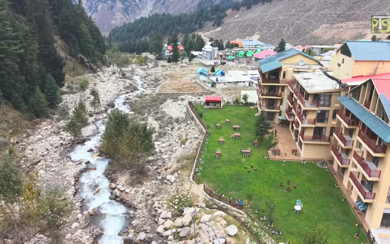 Sarai Hotel Naran aerial view — lawn, Kunhar river and mountain valley from drone photography