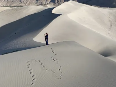 A female tourist at Katpana Desert Skardu